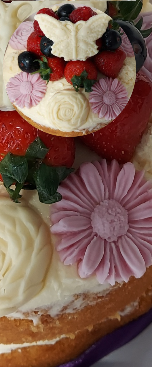 A closeup of a beautiful cake baked by Jeannettes of Faversham Bakery